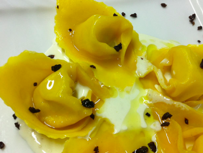 Ravioli with Garda extra virgin olive oil stuffing and black olive charcoals